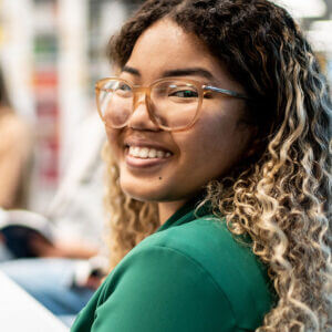 High school student smiling at the viewer